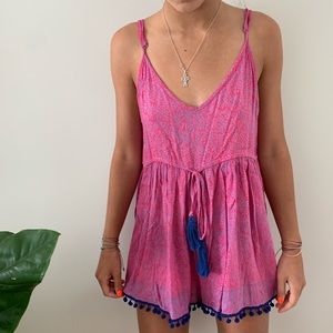 Flowy pink and blue romper.